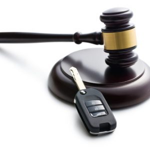car key and judge gavel